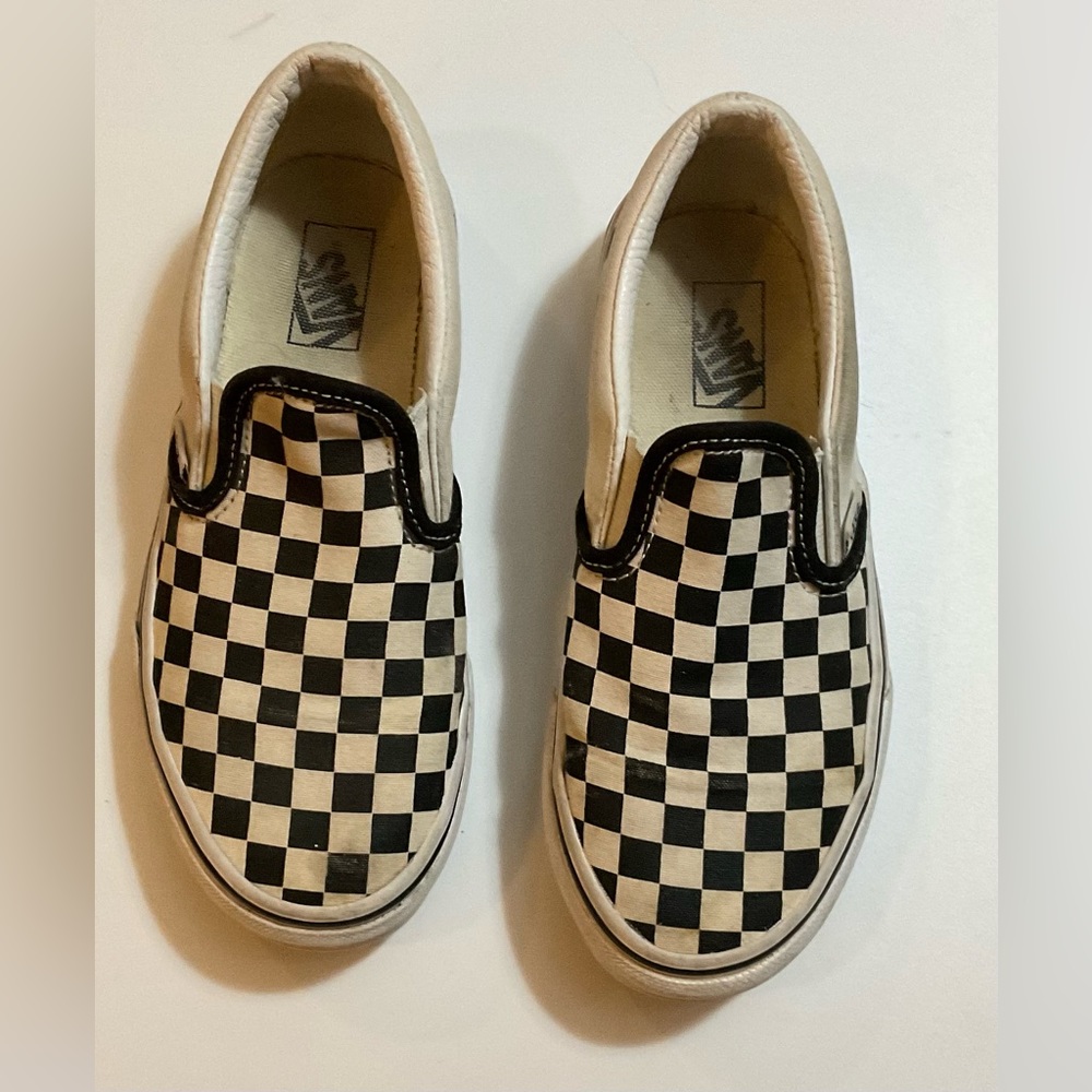 Vans kids size 3 checkered sneakers. They are used,worn but still have life too.